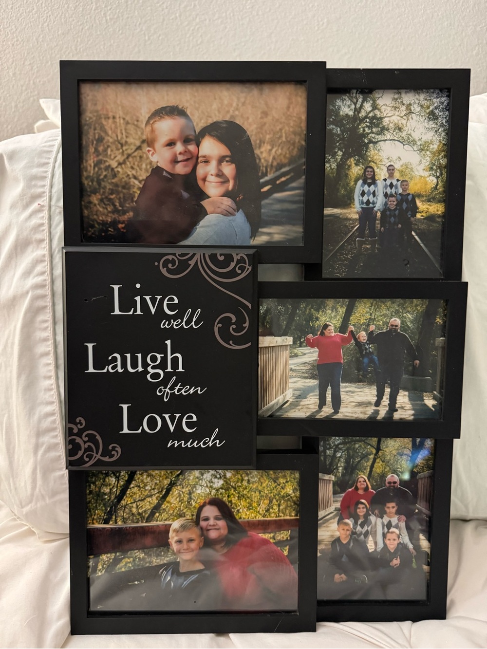 Black Multi-Photo Wall Frame with 'Live Well Laugh Often Love Much' Sentiment